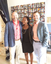 Yvette Posing with Two Investors