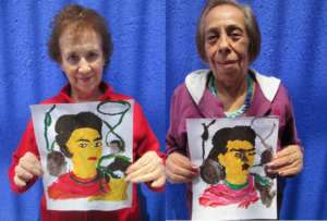 Two patients painting Frida Kahlo