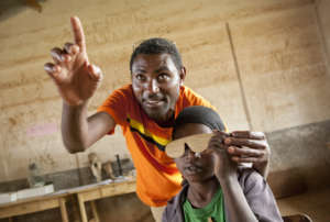 Teachers screen students at school in Ethiopia