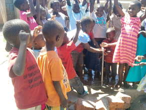 children enjoying tap water