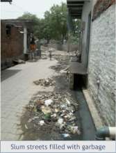 A regular sight for slum youth - garbage in lanes