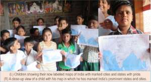 Children showing their labeled maps
