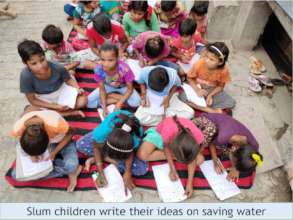 Slum children engrossed in writing their ideas