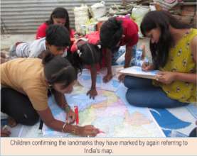 Children confirming their landmarks through map