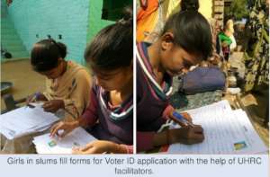 Girls filling application forms for Voter ID