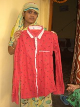Slum Woman Shows Sewed Men's Shirt