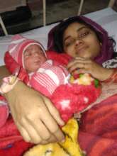 Neha with her first baby