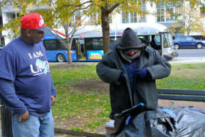 Shelter Hotline employee picking up a client