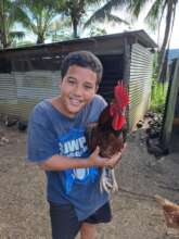 Grandson Keith with showy rooster
