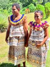 Eroni & Tetaake climbing the hill for wedding