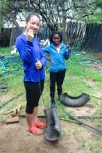 Camilla and Sibongile working on the swings