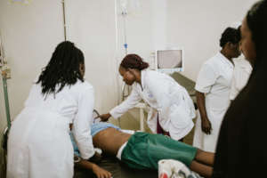 ECPs evaluating a patient at the Masaka ED