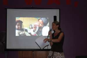 Stacey Chamberlain, co-Founder, emcees the event