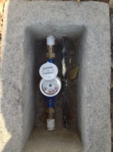 A recently installed water meter