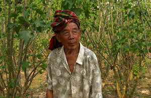 Tit Phua in his Jatropha plantation