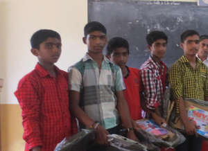 Kids collecting their new school kit and notebooks