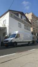 Van in front of our offices, before tailoring