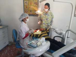 Vania treating a child age 8 with Dr. Ricci