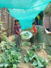 Peruvian children with garden produce