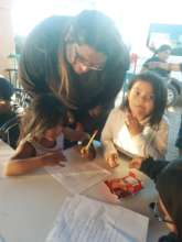 River mentors the young students in our programs