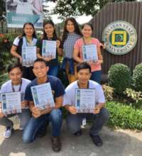 Visayas State Univ. scholars hold their awards