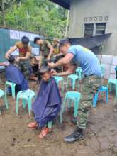 Local military provides haircuts for children