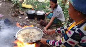 Moms cooking lunch at Manilop Elementary