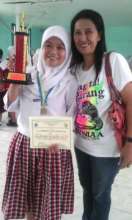 Joyful  Marvelyn with her school Principal