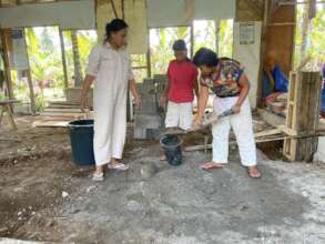 Everyone helps to build new school