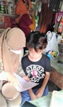 Teachers counseling pupils in their homes