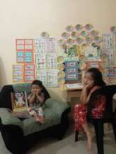 Classmates prepare for learning with "girl talk"