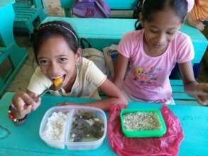 Lunch cooked by Moms in a Duenas Elementary School