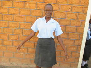 Vera also attends school with our help