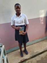 ORPHAN GIRL CHILD AT SCHOOL