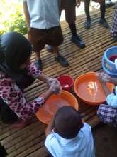 washing before lunch at Sahaya Elementary