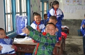 $10 to keep a kid warm for one year