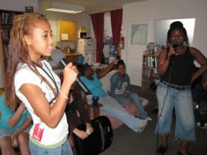 Girls singing during workshop they planned