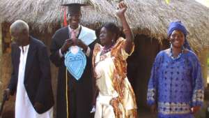 Stephen & family celebrating his graduation