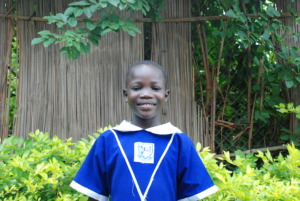 Gloria 7-years-old wearing her school uniform
