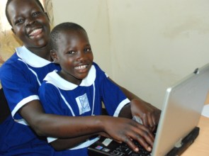 Gloria & cousin, first experience with a computer