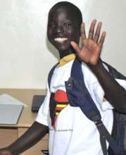 Julius excited receiving his first backpack