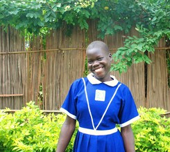 Kevin's delight in showing off her school uniform