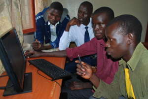 Stephen instructs three other sponsored students