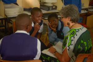 Director Rinda Hayes meets with sponsored students
