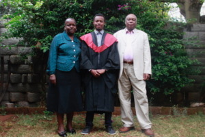 Salim with his aunt and uncle at graduation