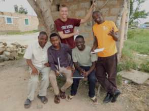 Salim working with other graduates in Taru