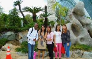 Salim, leading a tour in China