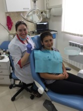 A boy receiving dental care first time in his life