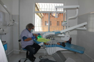 Dentist providing care at Tsaghgadzor Summer Camp