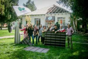 Celebrating removing the first sheets of asbestos